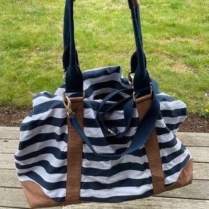 Merona blue and white striped tote with zipper closure at the top.